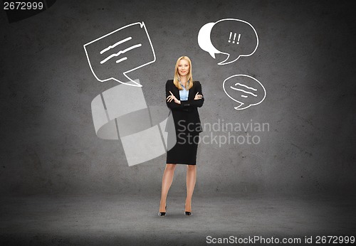 Image of friendly young smiling businesswoman