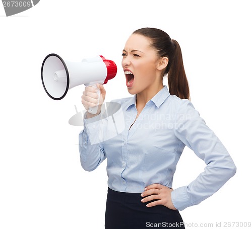 Image of screaming businesswoman with megaphone