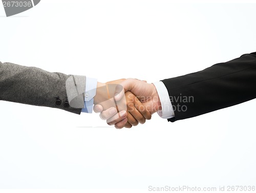 Image of businessman and businesswoman shaking hands