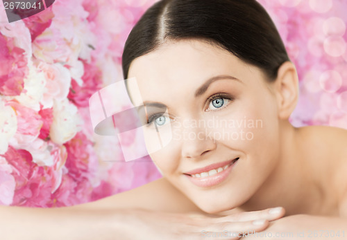 Image of smiling woman in spa salon