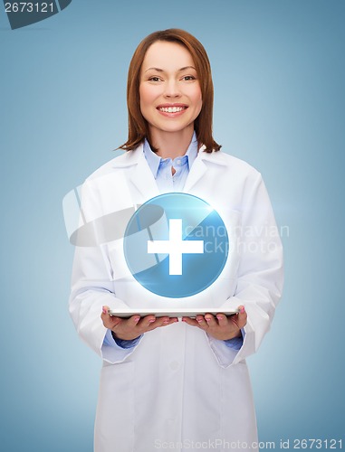 Image of smiling female doctor and tablet pc computer