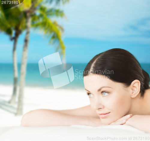 Image of smiling woman in spa salon