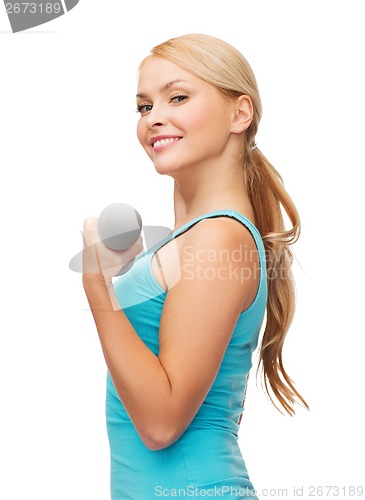 Image of young sporty woman with light dumbbells