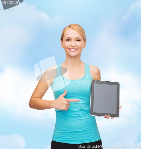 Image of sporty woman with tablet pc blank screen