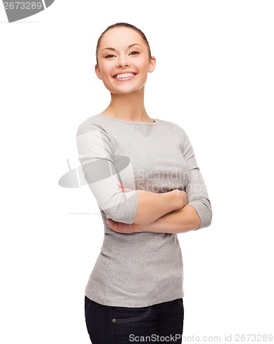 Image of smiling asian woman over with crossed arms