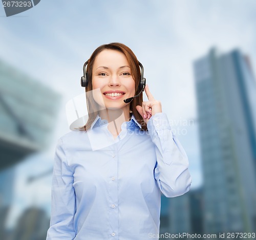 Image of friendly female helpline operator