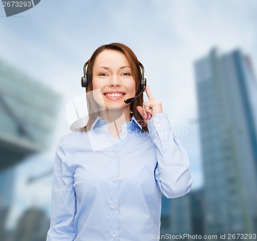 Image of friendly female helpline operator