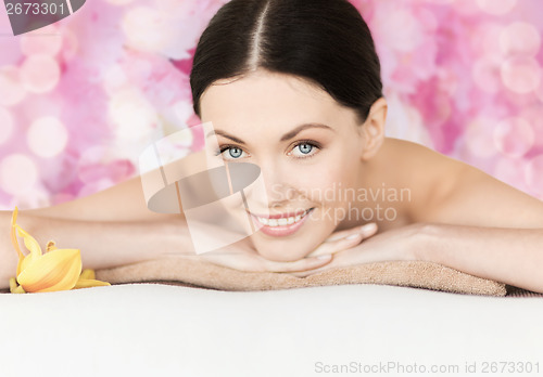 Image of smiling woman in spa salon