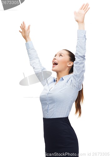 Image of laughing businesswoman waving hands