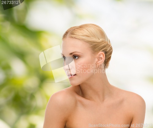 Image of face and shoulder of young woman
