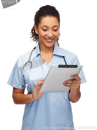 Image of doctor or nurse with stethoscope and tablet pc