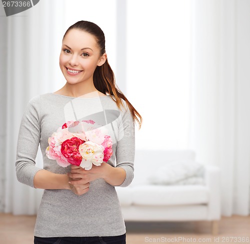 Image of young woman with bouquet of flowers