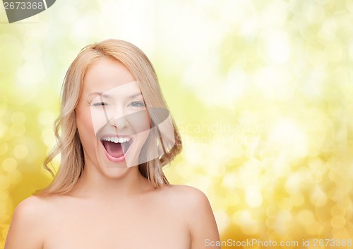 Image of beautiful woman with long wavy hair