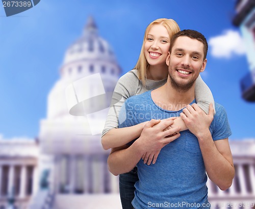 Image of smiling couple hugging