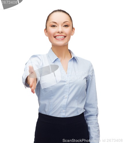 Image of businesswoman with opened hand ready for handshake