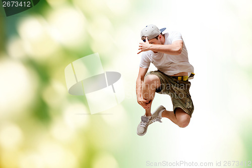 Image of male dancer jumping in the air