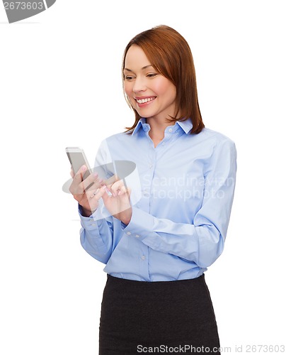 Image of young smiling businesswoman with smartphone