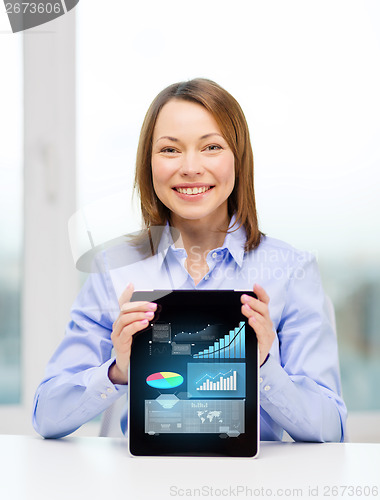 Image of smiling businesswoman with tablet pc computer