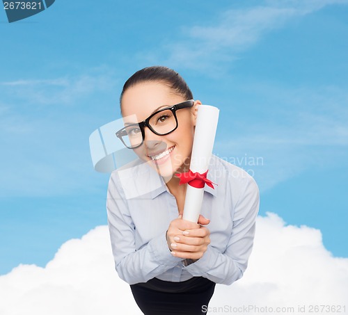 Image of smiling businesswoman in eyeglasses with diploma