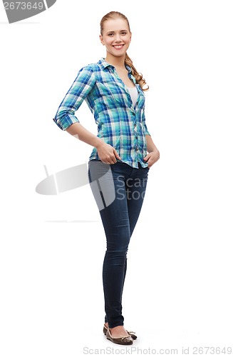 Image of smiling young woman in casual clothes