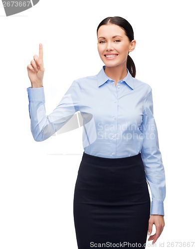 Image of smiling woman with her finger up