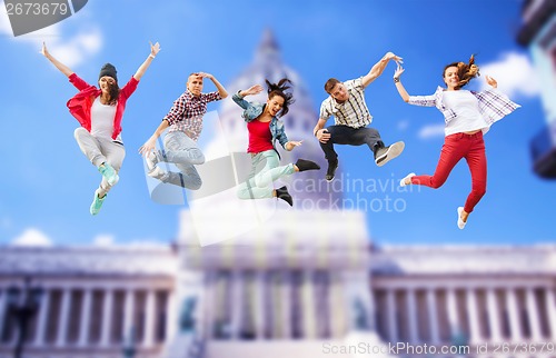 Image of group of teenagers jumping