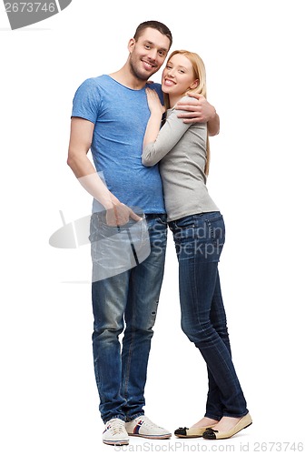 Image of smiling couple hugging