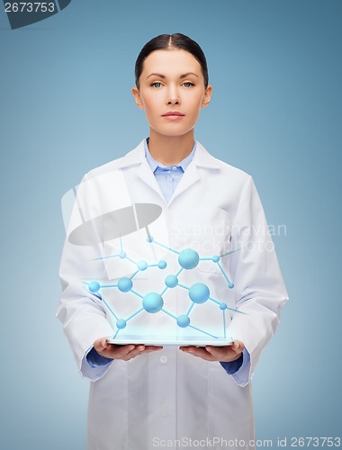 Image of female doctor without stethoscope and tablet pc