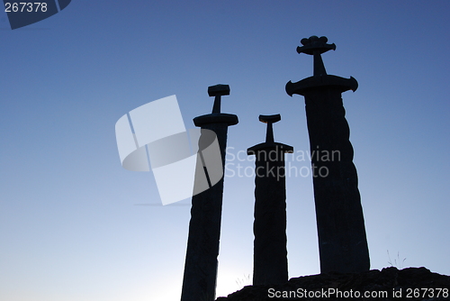 Image of Swords in rock