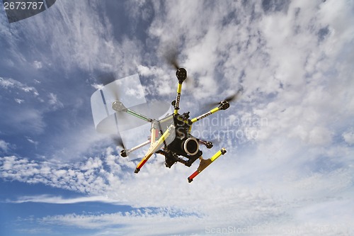 Image of Octocopter drone flying with camera