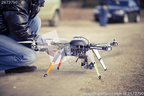 Image of Quadrocopter drone ready to takeoff