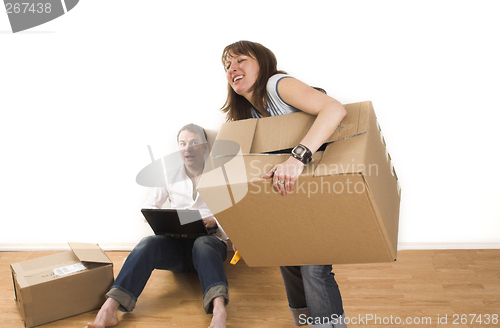 Image of couple moving in appartment