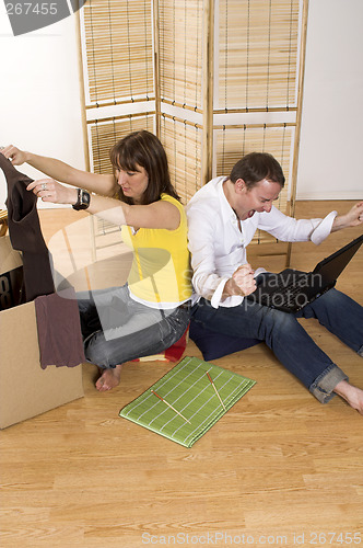 Image of happy couple in new place