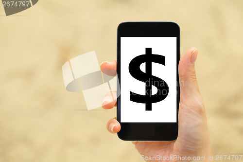 Image of Dollar sign on mobile phone