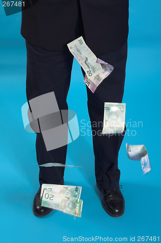 Image of businessman and money