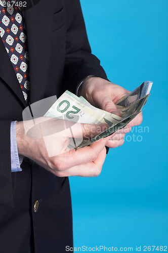 Image of businessman and money