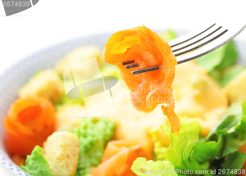 Image of Fresh salmon salad close up