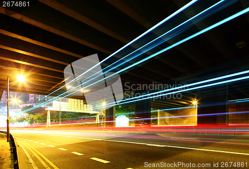 Image of Traffic trail pass though underpass