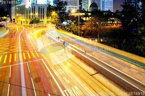 Image of Busy traffic in city  at night
