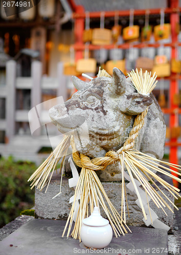 Image of Stone cow statue in Japanese temple 