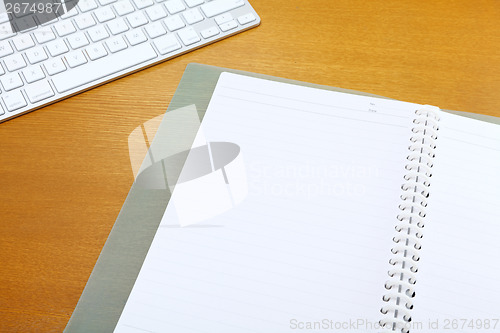 Image of Notepad and keyboard