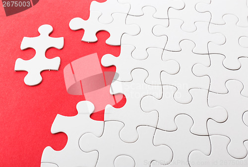Image of Incomplete puzzle with missing pieces