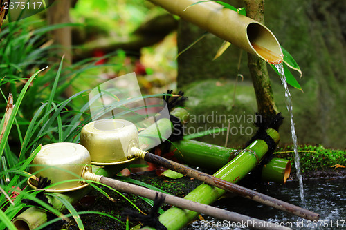 Image of Bamboo water fountain with ladle in Japanese temple