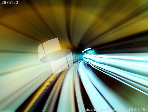 Image of Train moving fast in tunnel