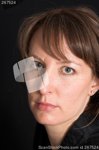 Image of woman portrait on black backdrop