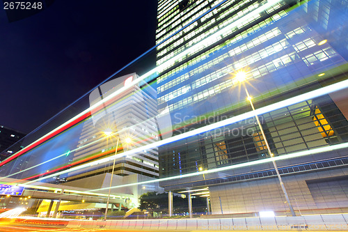Image of Fast moving car light in city