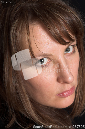 Image of woman portrait on black backdrop