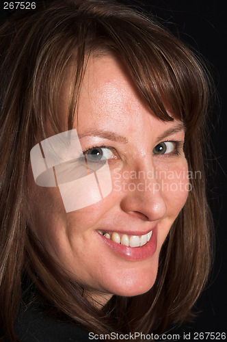 Image of woman portrait on black backdrop