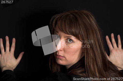 Image of woman portrait on black backdrop