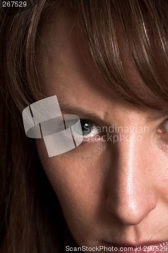 Image of woman portrait on black backdrop